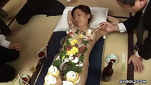 Old perverted businessman eat some sushi of hot chicks body